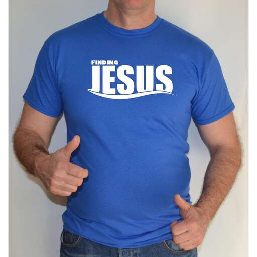 a man with a cross on his shirt