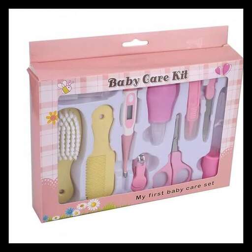 a baby shower box with a baby clothes pins inside.