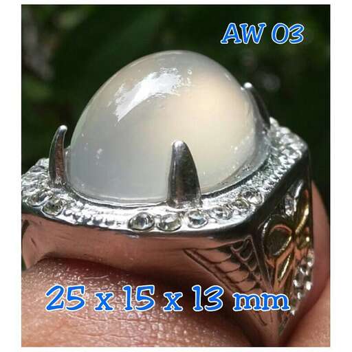 a rare silver ring with a pearl and diamonds.