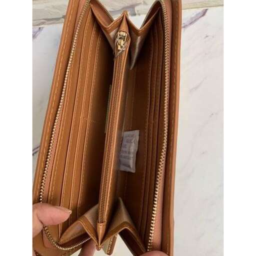 the wallet is made from leather.