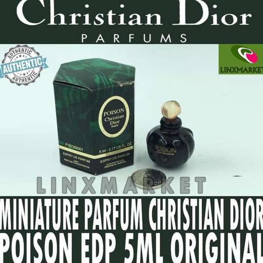 a bottle of perfume on a white background