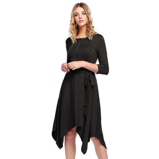 a black dress with a long neckline and a long skirt