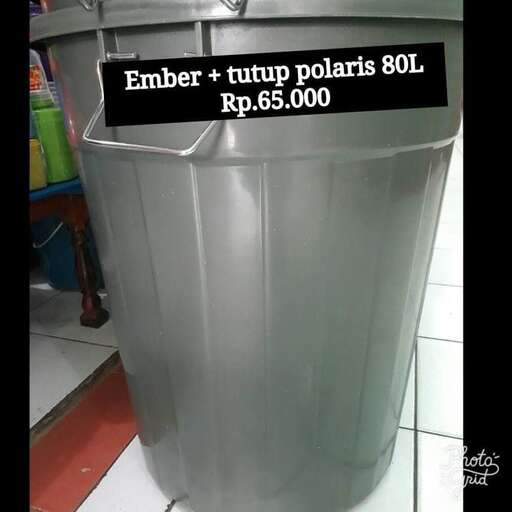 a large metal trash can with a sign on it.