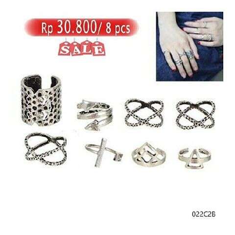 a ring made of silver and diamond rings