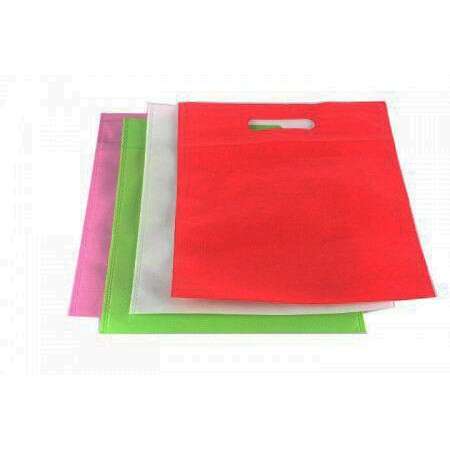 red paper in a green and white background