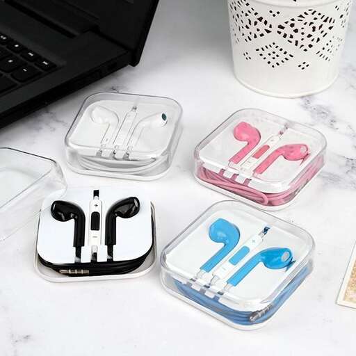 a table topped with electronics and accessories.