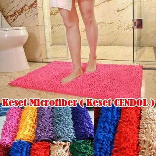 a woman standing on a pink rug in front of a toilet.