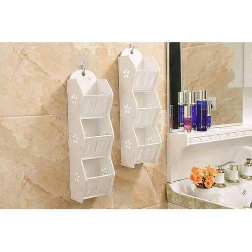 a bathroom with two towels hanging on the wall.