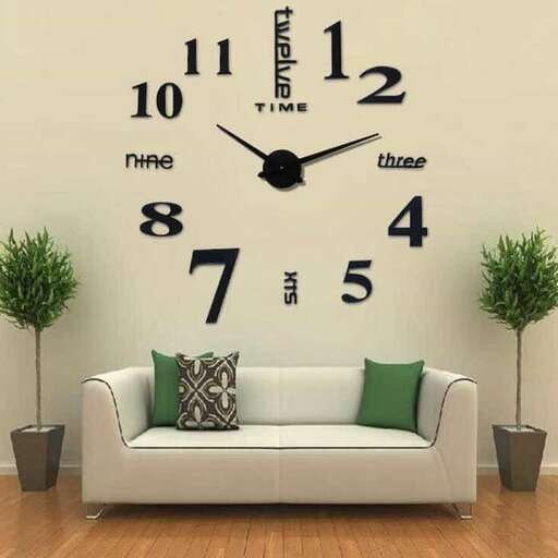 a living room with a couch and a wall clock.