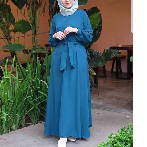 a woman in a blue dress