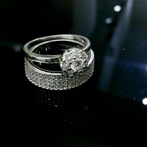 the engagement ring of person.