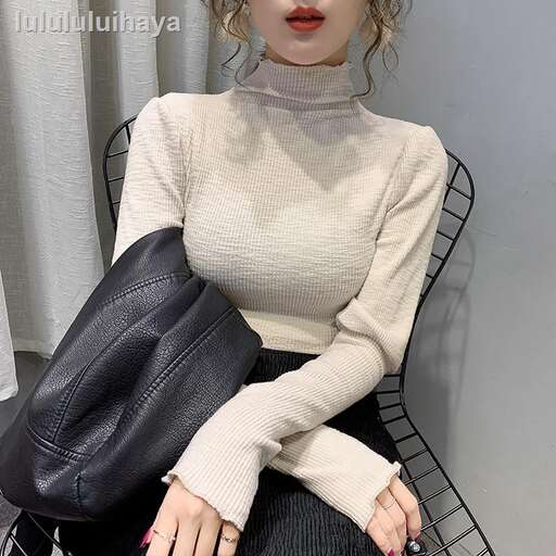 doll with a black purse and a black purse