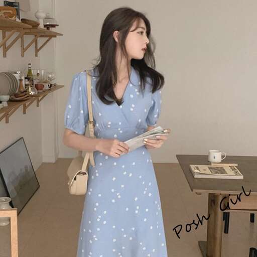 a woman in a blue dress