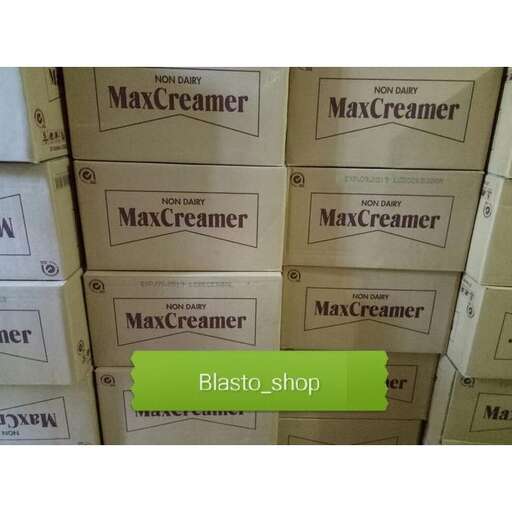 a large pile of boxes in a store.