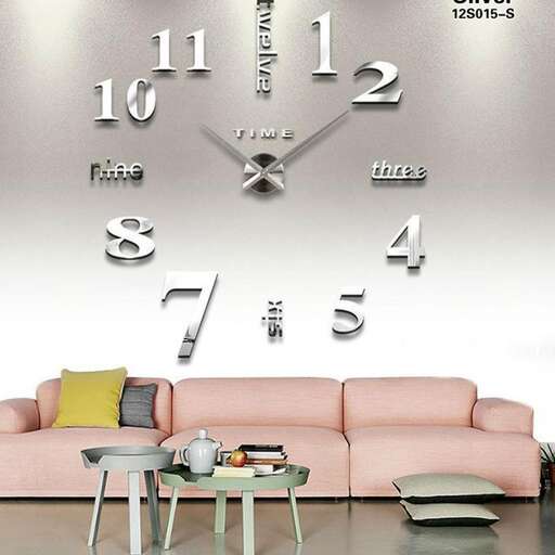 a living room with a couch, table, and a wall clock.