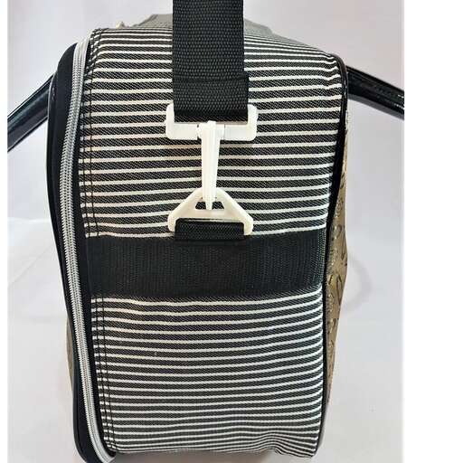 a black and white striped bag with a handle.