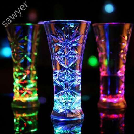 a set of three glasses with colored lights.