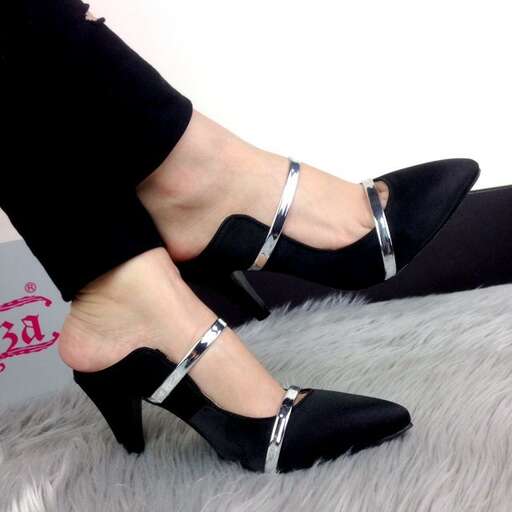 black high heeled shoes with silver buckles.