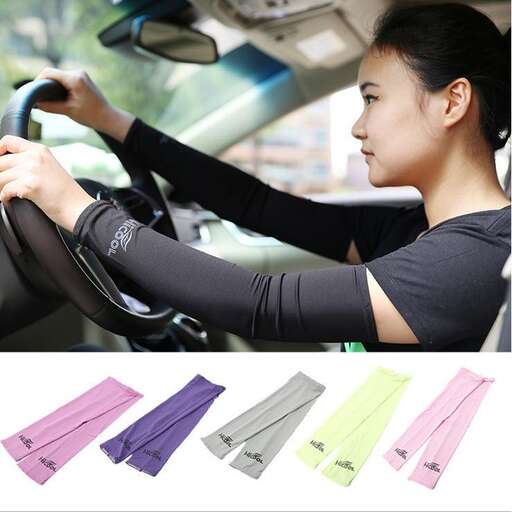 a woman driving a car with a set of leggings.