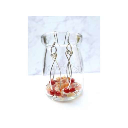 earrings in a glass jar