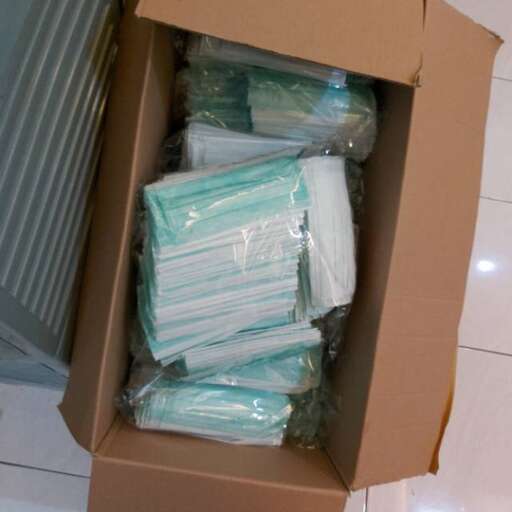 a box of folded towels