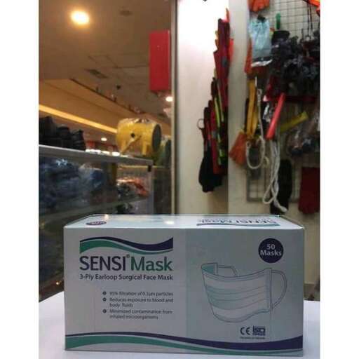 a box with a toilet and a box of facial tissue.