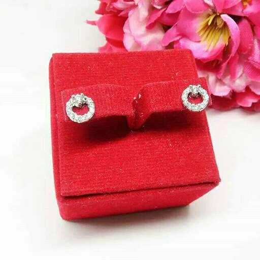 earrings in a red box