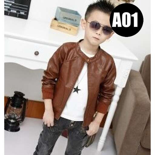 a little boy wearing a brown leather jacket and sunglasses.