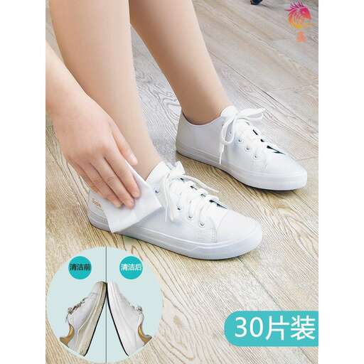 a pair of white sneakers with a woman's shoe
