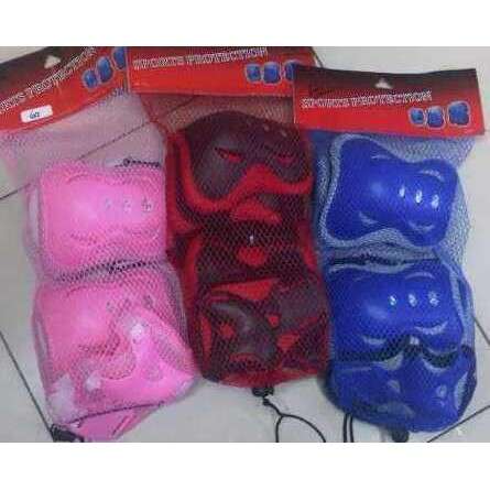 a set of three hot pink and blue baby toys.