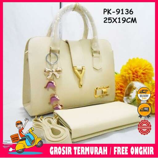 a bag with a gold chain and a gold chain.