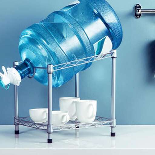 a blue water tank with cups and cups.