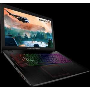 a laptop computer with a picture of a flying airplane on the screen.