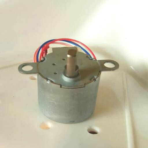 a metal container with a red, white and blue wire.