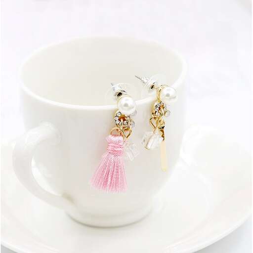 earrings with a pink dress and a pink ribbon.