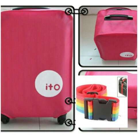 a pink suitcase with a sticker on it.