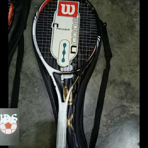 a tennis racket with a logo on it.
