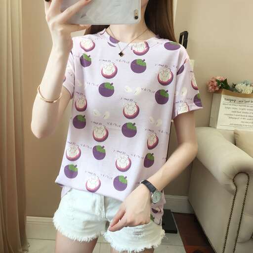 a shirt with a fruit design on it.