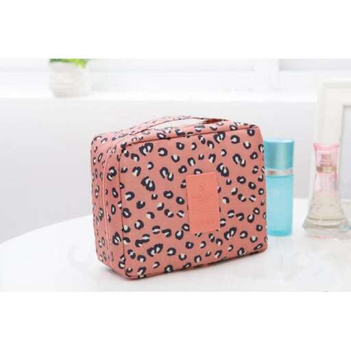 a pink bag with a pink zipper.