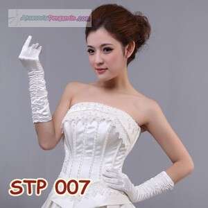 a woman in a white dress with a white glove.