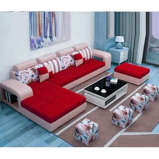 a living room with a couch, coffee table, and a coffee table.