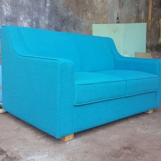 a couch made from a recycled plastic sheet.
