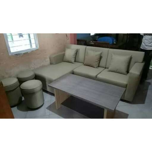 a living room with a couch and a table.