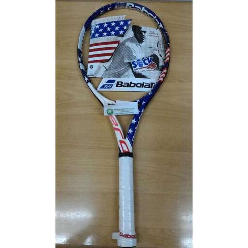 a tennis racket with a picture of a flag on it.