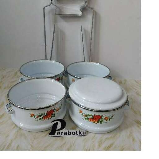 a white bowl sitting on top of a white counter.