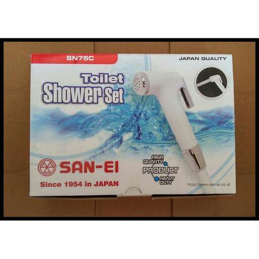 a package of toilet paper in the shape of a toilet.