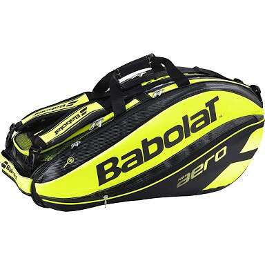 a yellow and black tennis racket for a beach