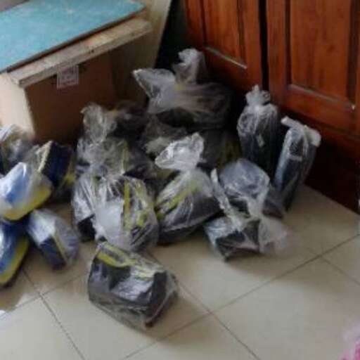 a pile of bags of trash
