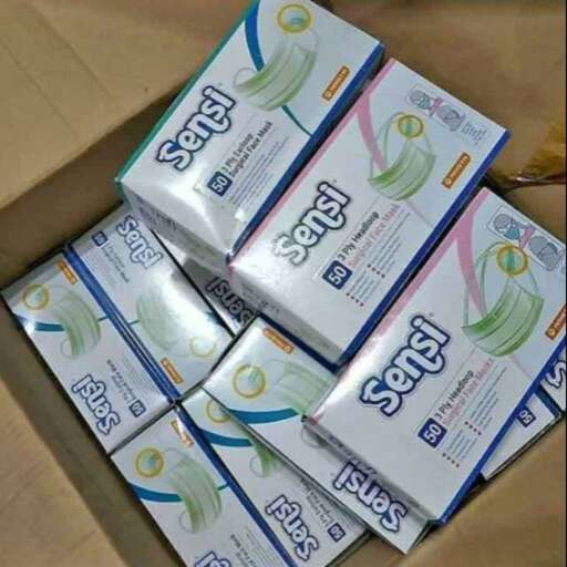 a box of toothpaste is packed with a package of toothpaste.