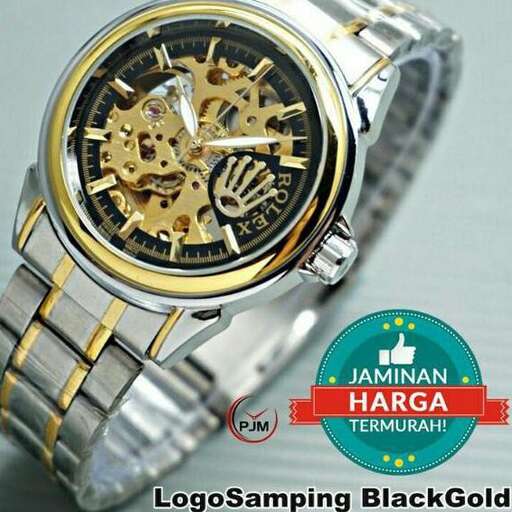 a watch with a gold finish